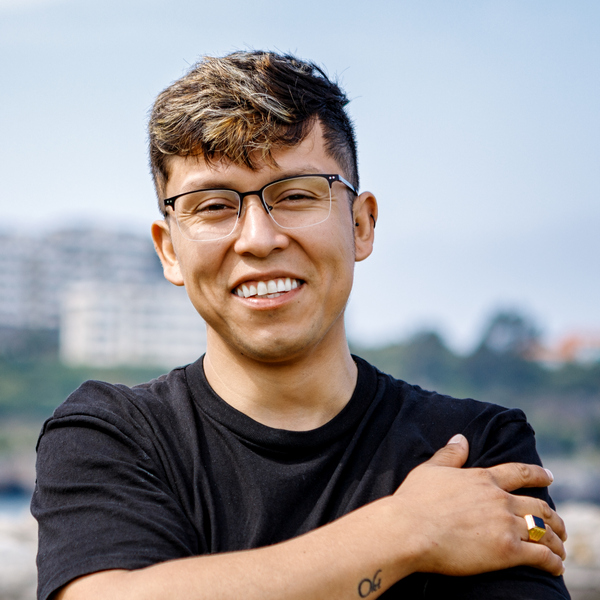 Portrait of a young smiling man outdoors