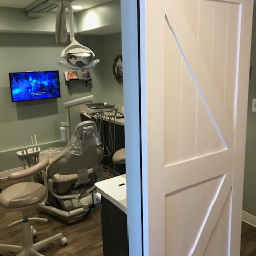 Treatment room with a dental chair in Bawa Dentistry Manassas Office