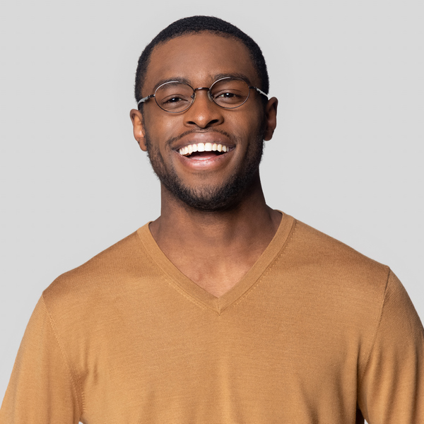 Get Picture-Perfect Teeth with Porcelain Veneers Man with a perfect teeth is smiling mobile